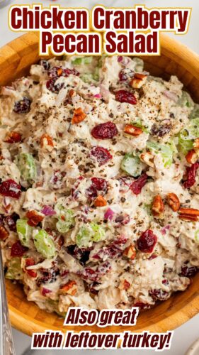 Pin of cranberry chicken salad in wooden bowl, with text overlay: Chicken Cranberry Pecan Salad - also great with leftover turkey!